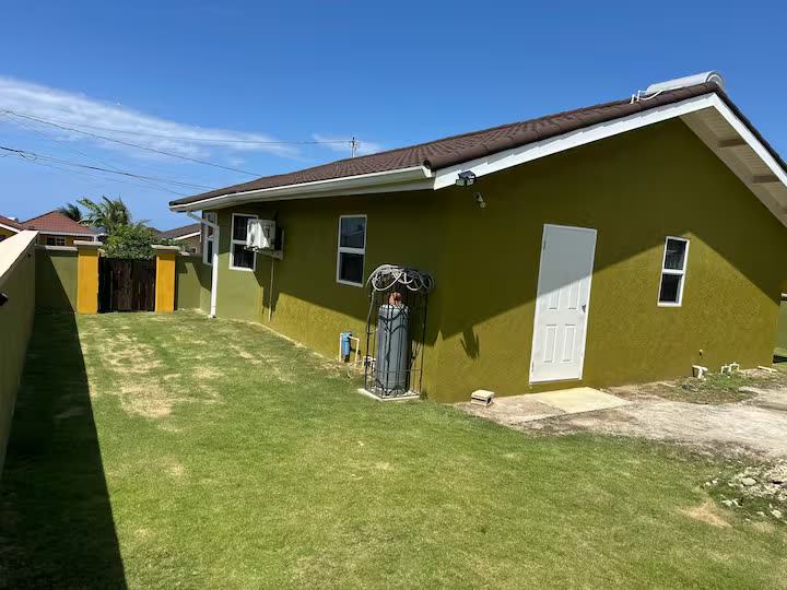 Back lawn and side of the house