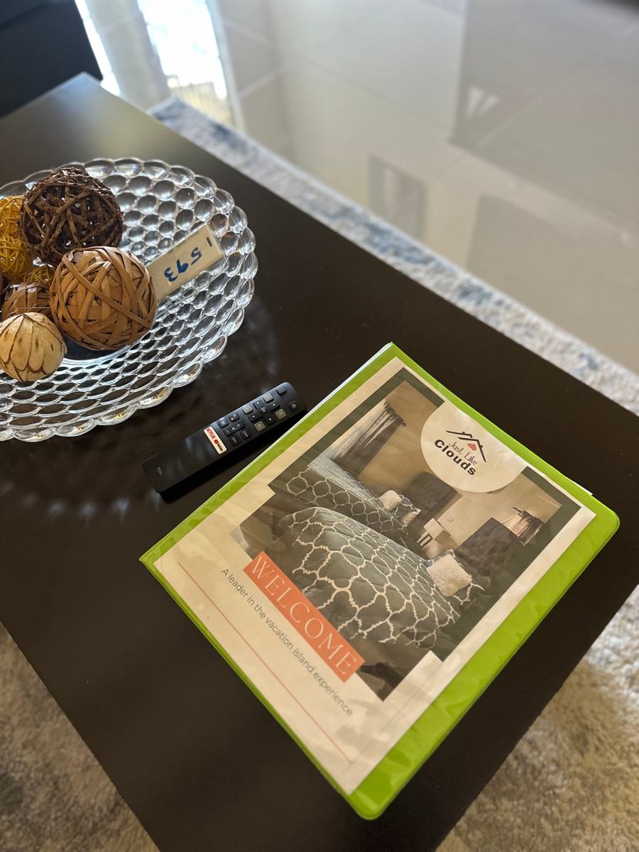 Welcome guide and TV remote on the coffee table